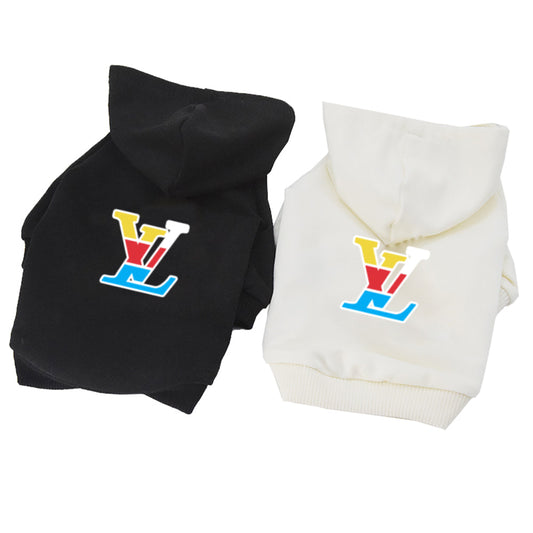 Black and cream white dog hoodies featuring attached hoods, ribbed trim, and colorful multicolor chest emblems.