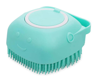 Soft silicone shampoo dispensing pet bath massage brush with non-slip grip and hanging hole for dogs, cats, puppies, and kittens.