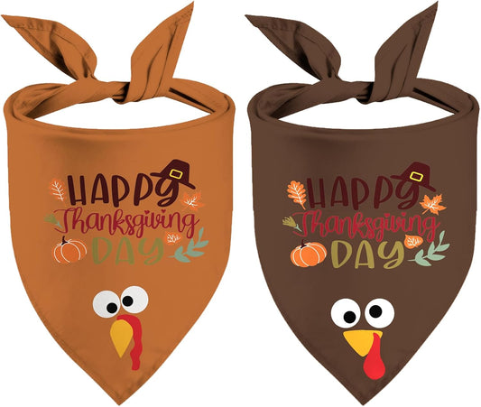 Orange and brown Thanksgiving dog bandanas with turkey faces and Happy Thanksgiving Day lettering for holiday parties and family photos