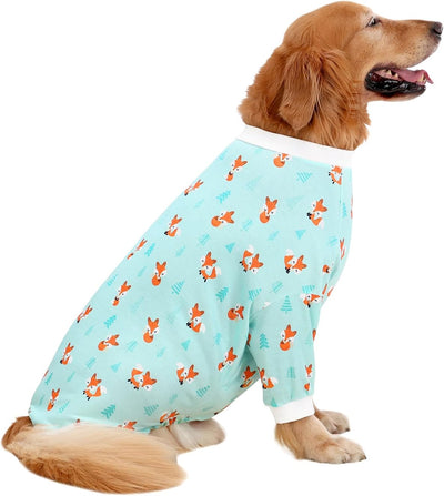 Golden Retriever wearing mint-blue fox print dog pajamas with white ribbed collar and cuffs.