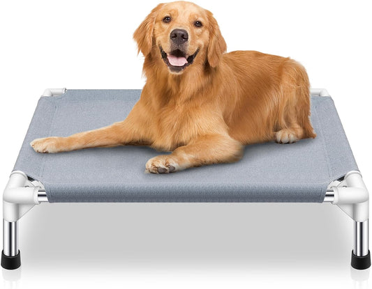 Medium dog resting on raised outdoor cooling bed