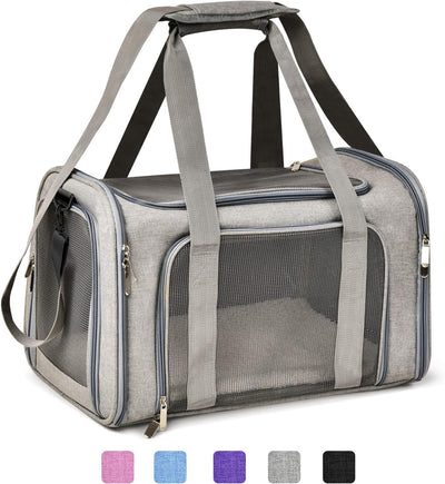 Airline approved soft pet travel carrier with breathable mesh panels, padded shoulder strap, and foldable waterproof design for small dogs and puppies.