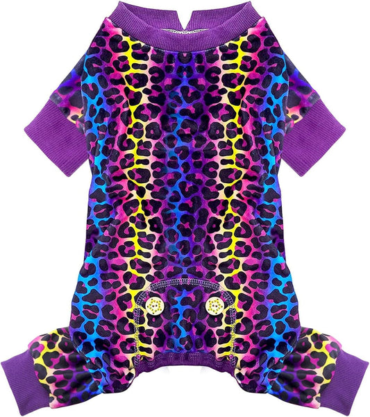Multicoloured rainbow leopard velvet dog pajamas with purple ribbed neck and four-leg cuffs on a white background