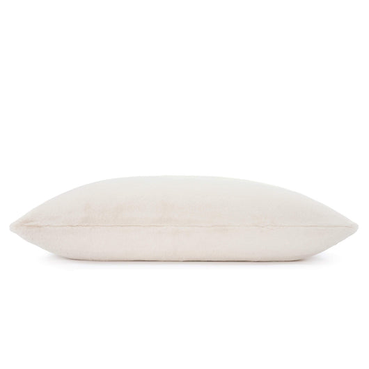 Natural cream faux fur pillow dog bed shown from the side on a white background.